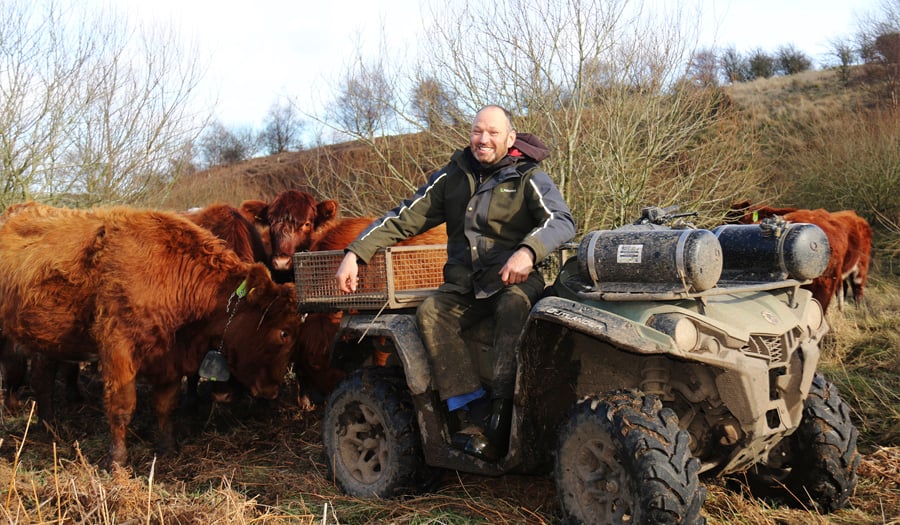 Cattle farmer using Nofence virtual fencing technology for conservation grazing